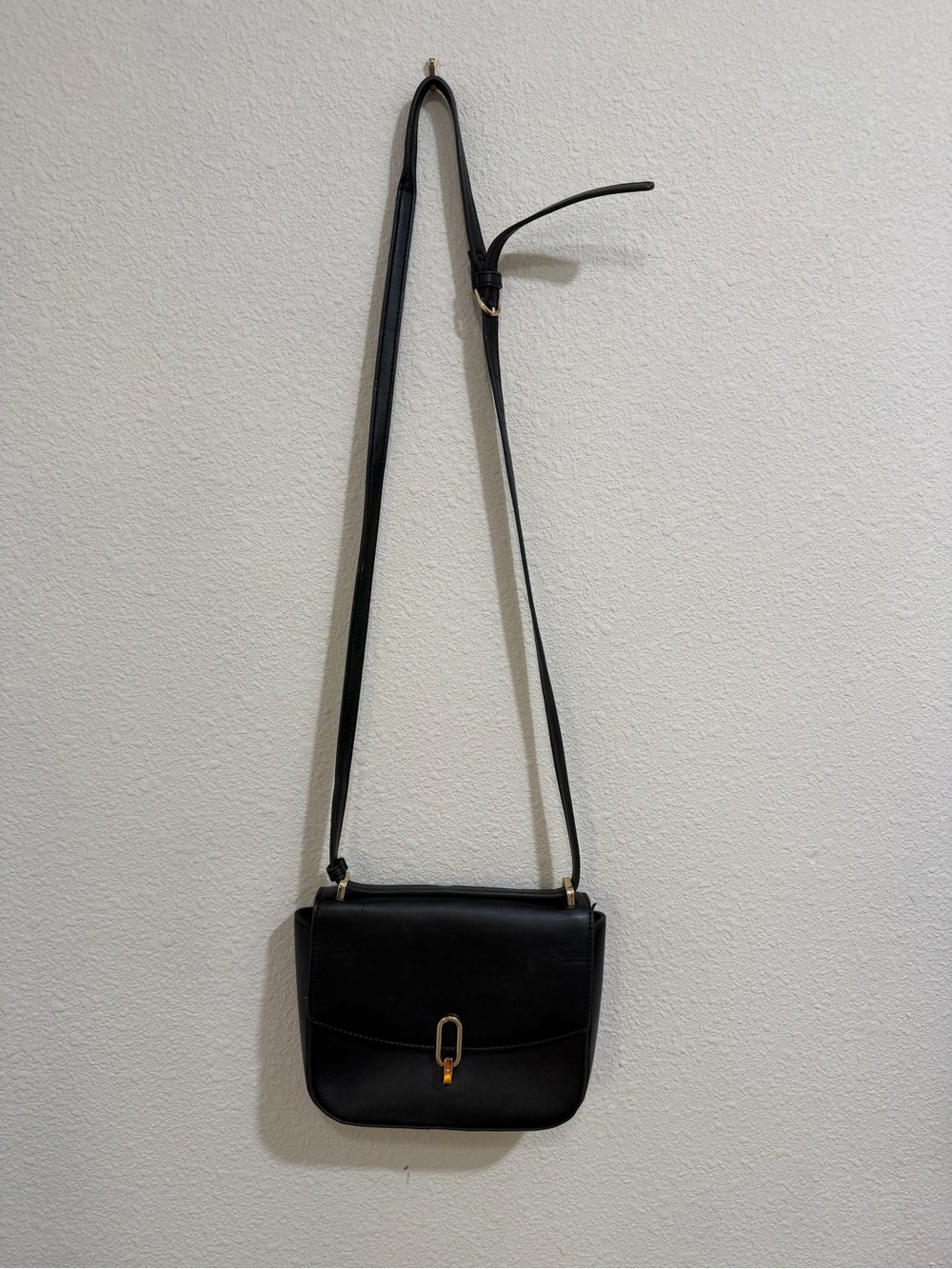 Black Minimalist Shoulder Bag with Gold Hardware - Picture 2 of 5